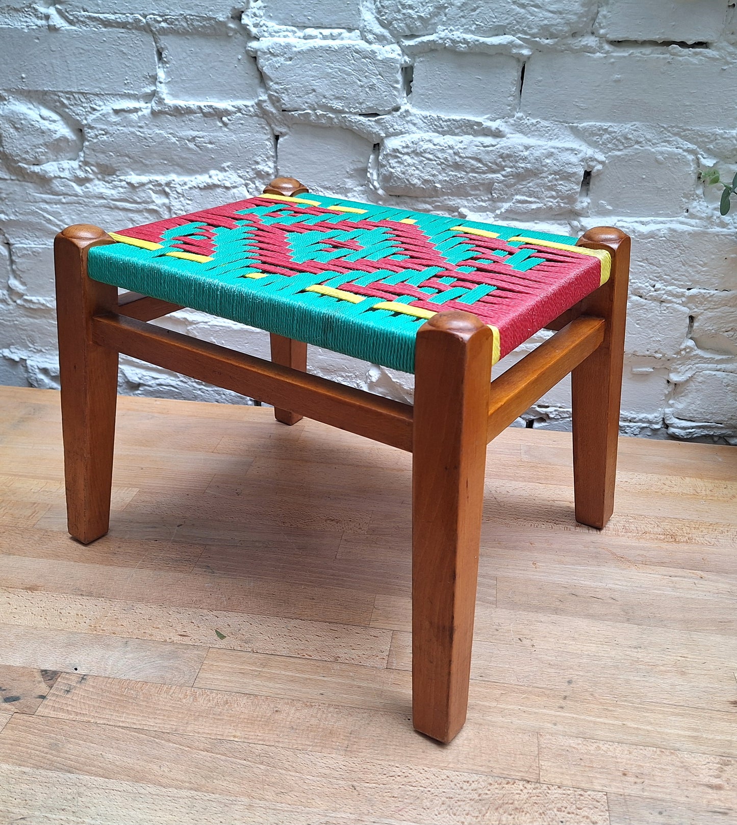 Funky Multicoloured Mid Century woven footstool.