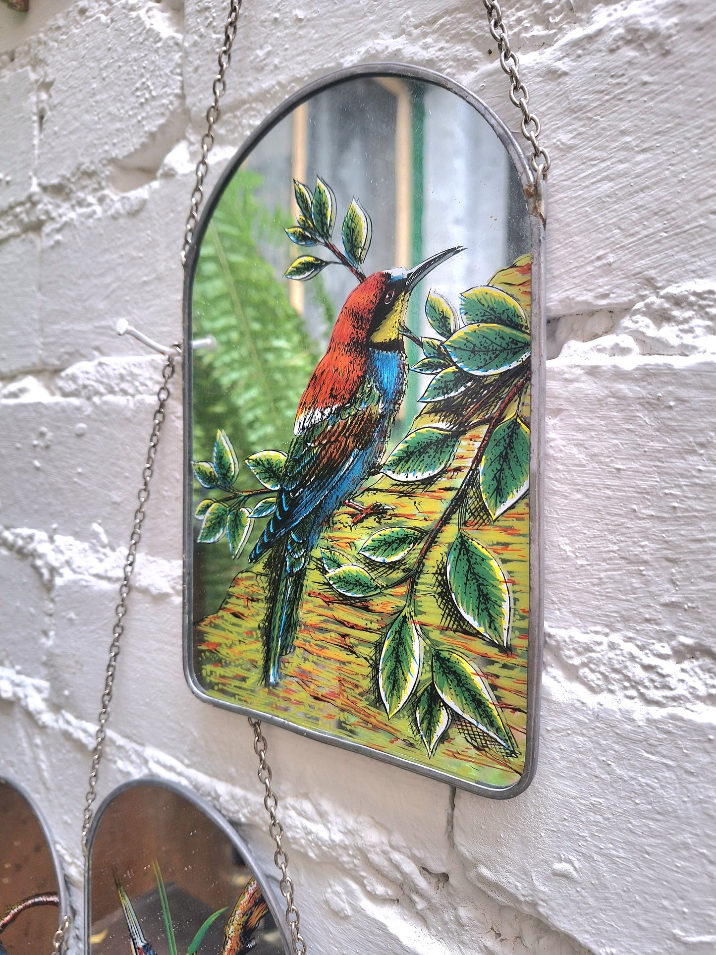 Vintage Set of Four Handpainted Hanging Bird Mirrors.