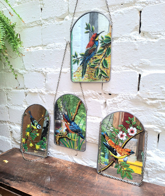 Vintage Set of Four Handpainted Hanging Bird Mirrors.